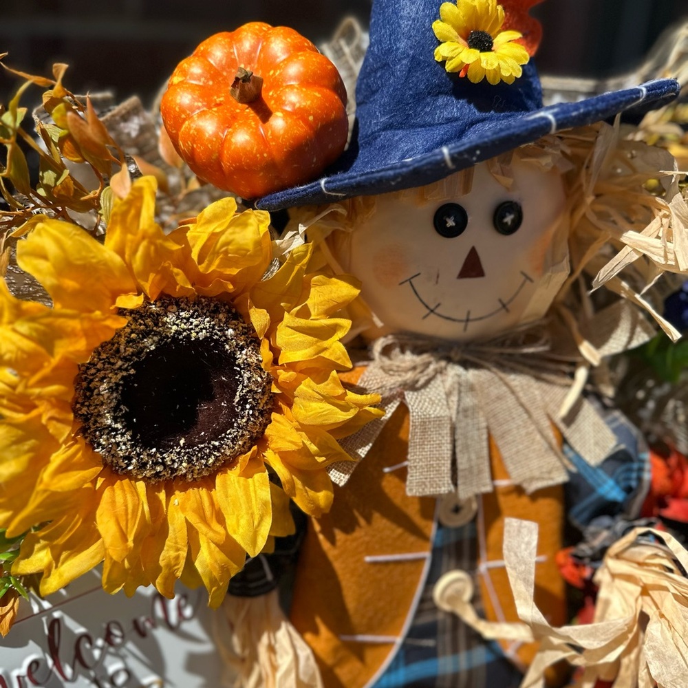 Autumn Scarecrow Decor with Sunflowers